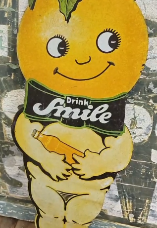 Drink Smile Die Cut Orange Boy SST Sign