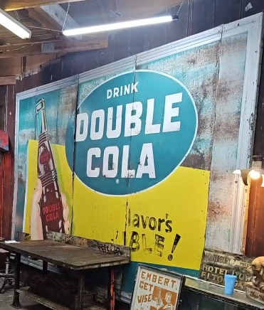 Drink Double Cola Billboard Sign