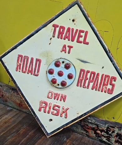 Travel at Own Risk Road Repairs Reflective Sign