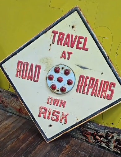 Travel at Own Risk Road Repairs Reflective Sign