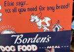 Elsie Says Borden’s Dog Food Meal Masonite Sign