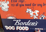 Elsie Says Borden’s Dog Food Meal Masonite Sign