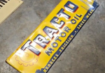 Tracto Motor Oil Reduces Friction Saves Wear SST Embossed Sign