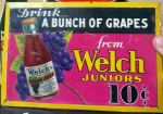 Welch’s Juniors 10 Cents Tin Over Cardboard Sign