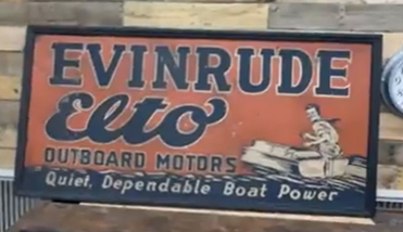 Evinrude Elto Outboard Motors Quiet Dependable Boat Power Man in Broken Boat SST Sign