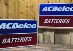 Two AC Delco Batteries Aluminum Embossed Signs