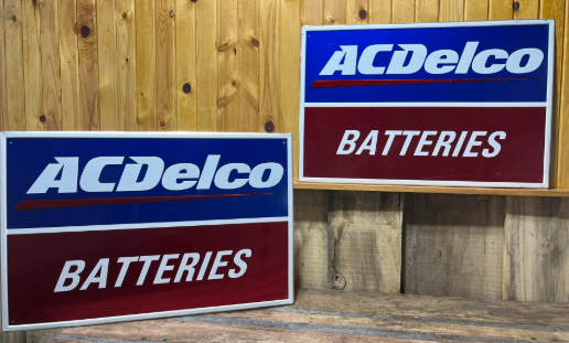 Two AC Delco Batteries Aluminum Embossed Signs