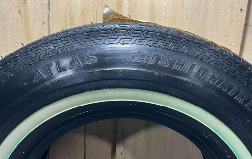 Atlas Tire Stand SST Sign and Tire