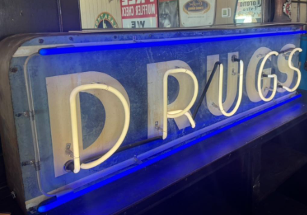 Drugs DST Sign with Neon on One Side