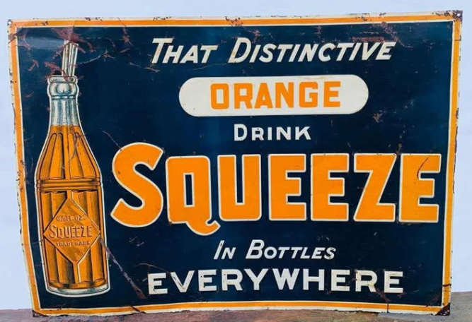 Drink Orange Squeeze in Bottles Embossed SST Sign