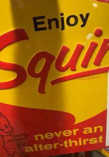 Enjoy Squirt Never an After Thirst SST Embossed Sign