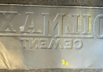 OilMax Cement SST Embossed Sign