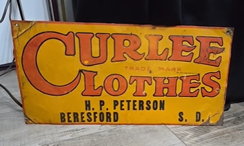 Curlee Clothes Beresford South Dakota SST Embossed Sign