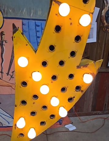 Lighted Curved Arrow DST Sign