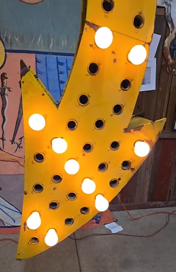 Lighted Curved Arrow DST Sign