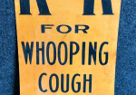 K and K Whooping Cough Tawas City Michigan SST Sign