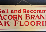 Celluloid and Tin Over Cardboard Acorn Brand Oak Flooring Sign