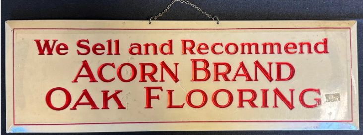 Celluloid and Tin Over Cardboard Acorn Brand Oak Flooring Sign