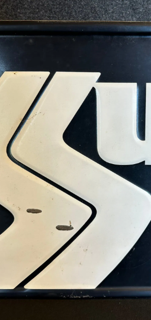 Summit Tires Embossed SST Sign