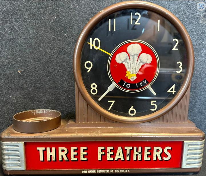 Three Feathers Whiskey Lighted Motion Counter-Top Bottle Display Clock