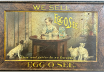 We Sell Egg-O-See SST Lithograph Wood Grain Sign