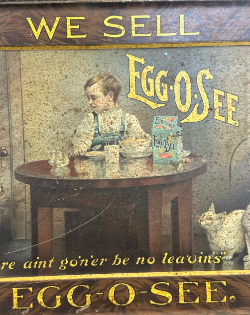 We Sell Egg-O-See SST Lithograph Wood Grain Sign