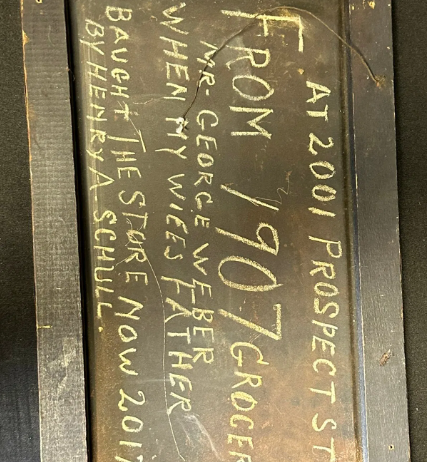 We Sell Egg-O-See SST Lithograph Wood Grain Sign