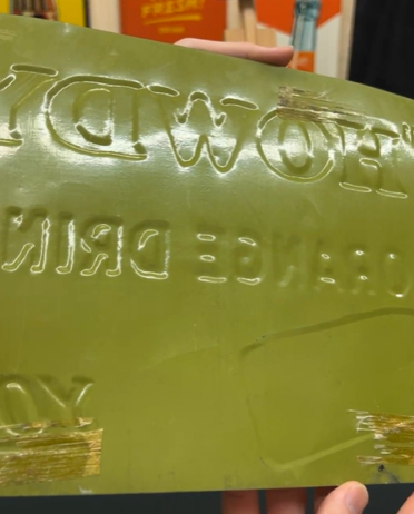 Howdy Orange Drink Good for You SST Embossed Sign