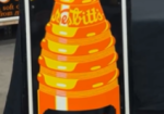 Nesbitt’s Orange Soda Pop Vertical Bottle SST Embossed Sign