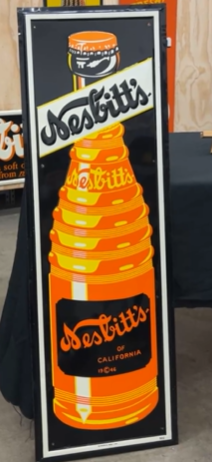 Nesbitt’s Orange Soda Pop Vertical Bottle SST Embossed Sign