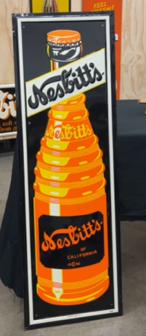 Nesbitt’s Orange Soda Pop Vertical Bottle SST Embossed Sign