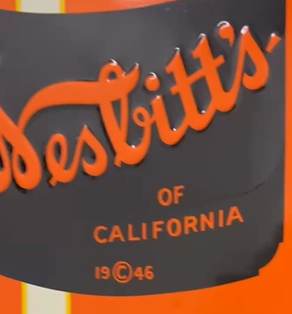 Nesbitt’s Orange Soda Pop Vertical Bottle SST Embossed Sign