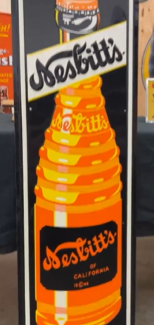 Nesbitt’s Orange Soda Pop Vertical Bottle SST Embossed Sign