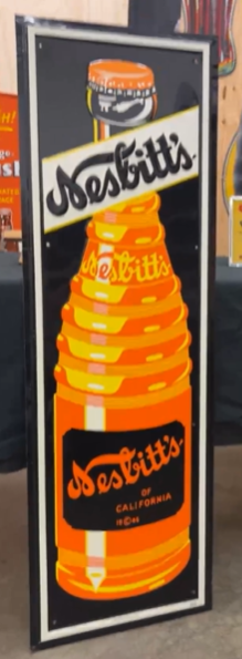 Nesbitt’s Orange Soda Pop Vertical Bottle SST Embossed Sign