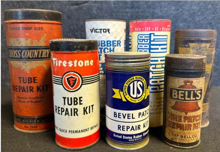 Lot 7 Early Metal Tire Tube Repair Kits Advertising Cans: Cross Country, Firestone, US, Bells, Wards
