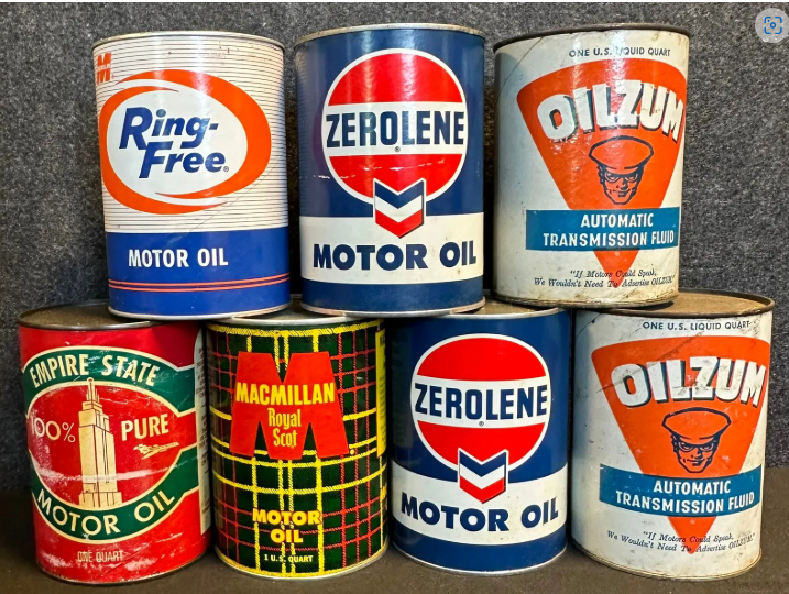 Seven Composite Quart Oil Cans: MacMillan, Zerolene, Oilzum, Empire State