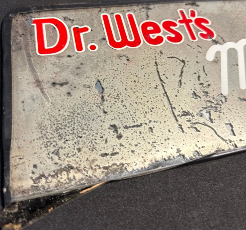 Dr. West’s Miracle-Tuft Toothbrush Reverse Painted Glass Dental Sign