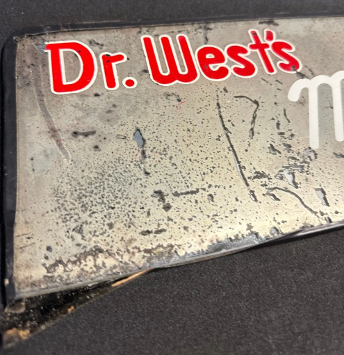 Dr. West’s Miracle-Tuft Toothbrush Reverse Painted Glass Dental Sign