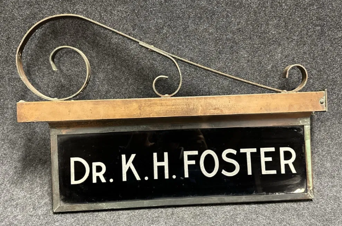 Dr. K. H. Foster Brass Flange Lighted Art Deco Advertising Sign with Bracket
