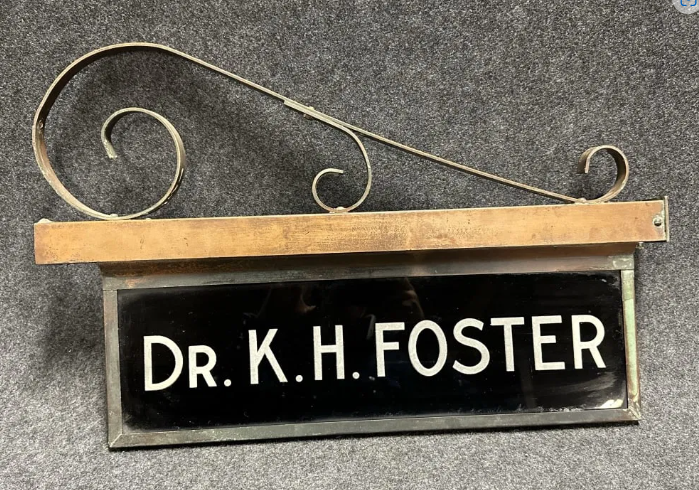Dr. K. H. Foster Brass Flange Lighted Art Deco Advertising Sign with Bracket