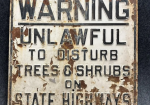 Warning Unlawful To Disturb SST Embossed Sign