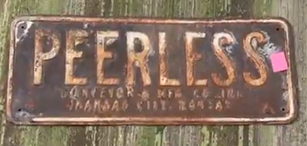 Peerless Conveyor Manufacturing Kansas City SST Embossed Sign