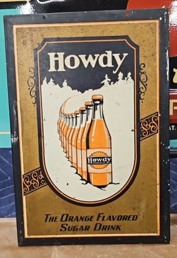 Howdy the Orange Flavored Sugar Drink SST Sign