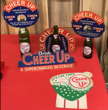 Cheer Up Supercharged Beverage Bottle Toppers Sign and Bottle Displays