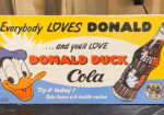 Donald Duck Cola Paper Sign with Two Bottles