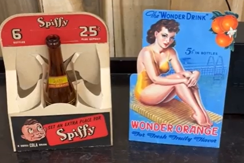 Wonder Orange Cardboard Sign and Spiffy Six-Pack Carrier