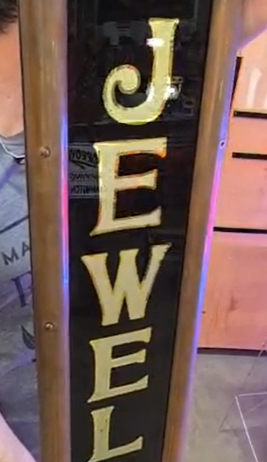 Jewelry Brass-Framed Reverse on Glass Sign