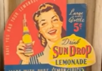 Two Sun Drop Cardboard String Hanger Signs