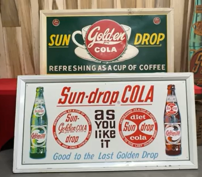 Two Sun Drop Golden Cola SST Embossed Signs